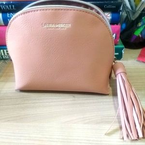 Laura Mercier makeup bag with tassel and bonus concealer